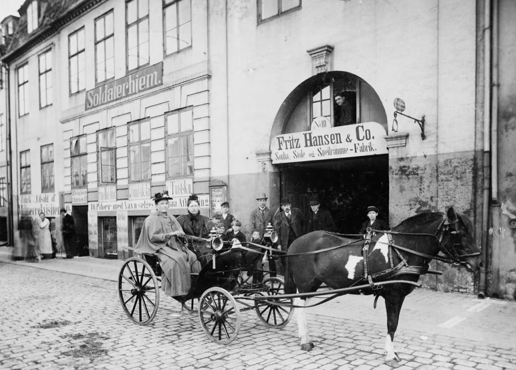 Horse and cart outside the original fritz hansen store founded in 1872.